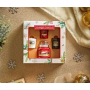Yankee Candle Magical Christmas Morning Unwrap The Magic - Rozbalte kouzlo vonná svíčka Classic malá sklo 104 g + Singing Carols - Zpívání koled + Holiday Hearth - Sváteční krb + Surprise Snowfall - Sněhové překvapení vonná svíčka votivní 3 x 49 g, vánoční dárková sada