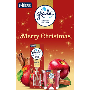 Glade Merry Christmas Warm Apple Pie jabłko i cynamon pachnące patyczki i świeca zapachowa 50 ml + 112 g, zestaw prezentowy